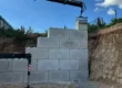 mur de soutènement, TETRA BLOC, bloc béton, béton bloc, béton block, camion grue